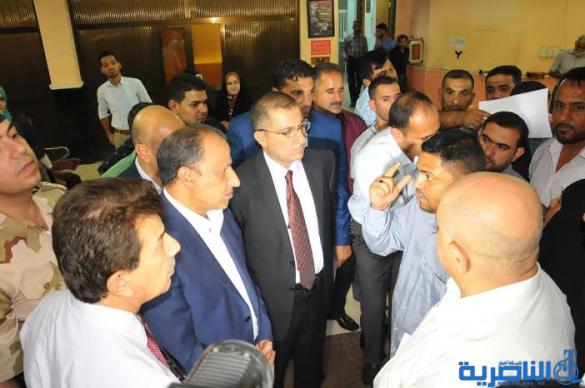 محافظ ذي قار يؤدي مهام عمله من موقع ادنى في دائرة صحة المحافظة - تقرير مصور -