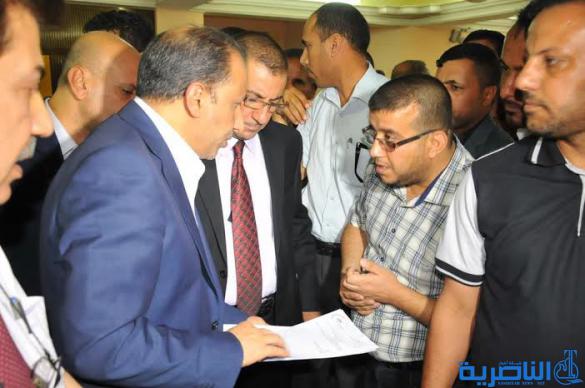 محافظ ذي قار يؤدي مهام عمله من موقع ادنى في دائرة صحة المحافظة - تقرير مصور -