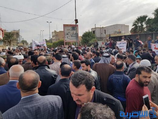 بالصور:العشرات يتظاهرون ضد الخصخصة في ذي قار