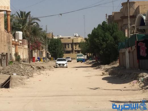 بالصور : اعمال الاكساء تتواصل في شارع بغداد وعدد من احياء الناصرية