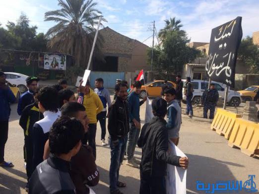  بالصور : رياضيون يتظاهرون في الناصرية ويهتفون ( الملاعب خط احمر )