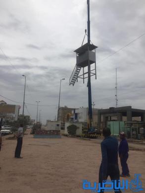  بالصور : رفع "الصبات الكونكريتية" الحيطة بمصرف الرافدين في صوب الشامية