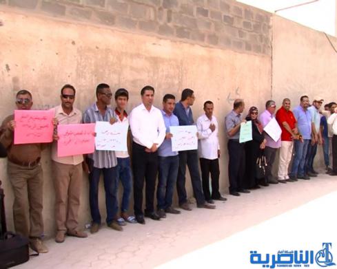  صحافيو ذي قار يتظاهرون لالغاء شرط مسقط الراس في توزيع الاراضي السكنية - تقرير مصور -
