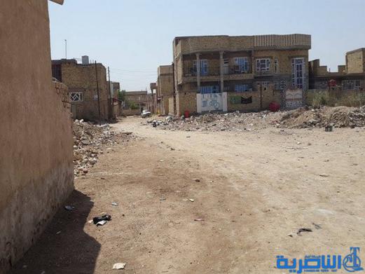 حي التجار في الشطرة بلا شوارع معبدة ، والبلدية ترهن الامر بتلكؤ مشر