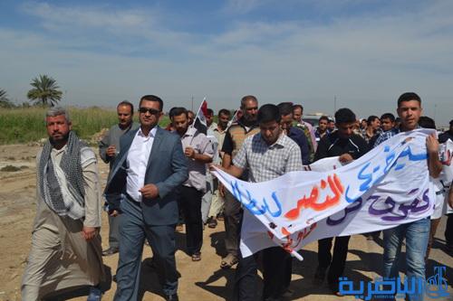 خريجون عاطلون ينظمون مسيرة راجلة من النصر الى الناصرية للمطالبة بالتعيين - تقرير مصور -