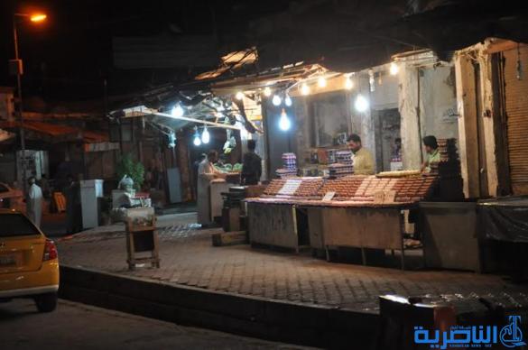 بالصور : ليالي سوق الشيوخ وشوارعها المضيئات