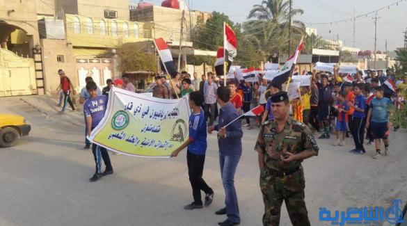 مسيرة شبابية في سوق الشيوخ دعما للجيش والحشد الشعبي