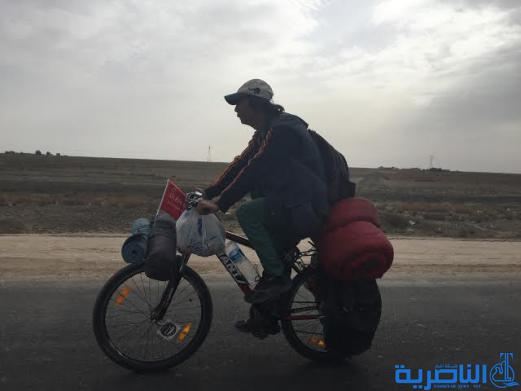 رحالة صيني يصل الناصرية على دراجته الهوائية ويثني على كرم الضيافة - تقرير مصور -