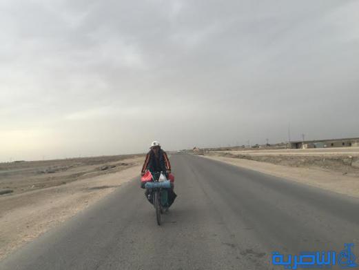  رحالة صيني يصل الناصرية على دراجته الهوائية ويثني على كرم الضيافة - تقرير مصور -