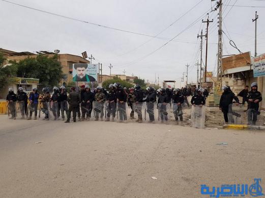 بالصور:العشرات يتظاهرون ضد الخصخصة في ذي قار