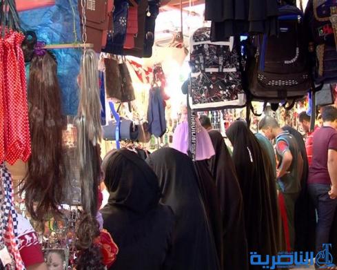 رغم غلاء الاسعار ، اسواق العيد في الناصرية منتعشة والكليجة على موائد المهنئين - تقرير مصور -