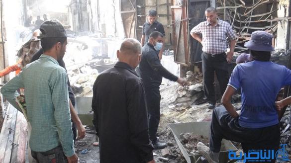 بالصور : بلدية الشطرة ترفع 1250 طنا من انقاض حريق سوق الخان