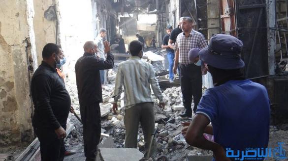 بالصور : بلدية الشطرة ترفع 1250 طنا من انقاض حريق سوق الخان
