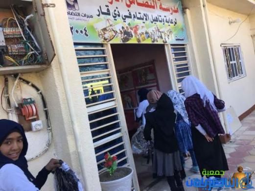 تقرير مصور حول توزيع مبرة التضامن الاولى في الناصرية ملابس الزي الموحد على التلاميذ الايتام