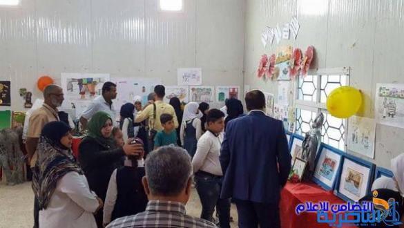 بالصور :: مدرسة التضامن الأولى للأيتام في الناصرية تقيم معرضا للرسوم بالتعاون مع صحة ذي قار
