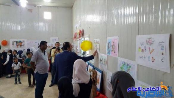 بالصور :: مدرسة التضامن الأولى للأيتام في الناصرية تقيم معرضا للرسوم بالتعاون مع صحة ذي قار
