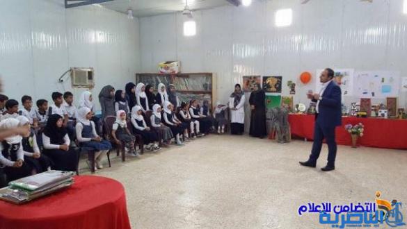 بالصور :: مدرسة التضامن الأولى للأيتام في الناصرية تقيم معرضا للرسوم بالتعاون مع صحة ذي قار