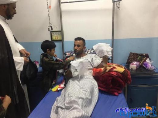 بالصور .. أيتام مبـرة التضامن الاولى: يتفقدون جرحى الحشد الراقدين في مستشفى الحسين التعليمي في الناصرية