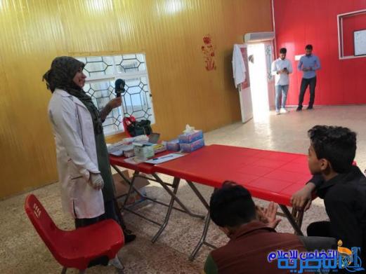 مجموعة من أطباء الأسنان يجرون كشفا مجانيا لأيتام مبرة التضامن في الناصرية - مصور-‎