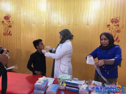 مجموعة من أطباء الأسنان يجرون كشفا مجانيا لأيتام مبرة التضامن في الناصرية - مصور-‎