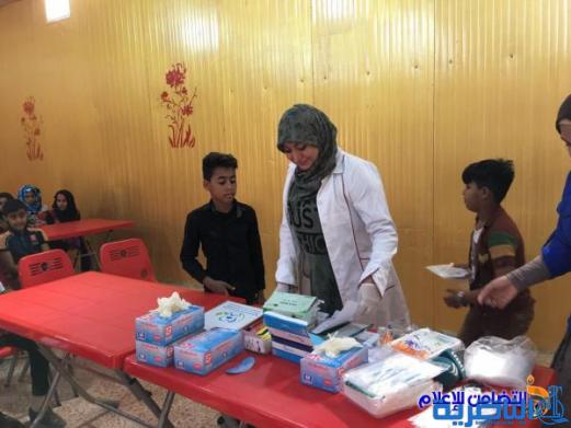 مجموعة من أطباء الأسنان يجرون كشفا مجانيا لأيتام مبرة التضامن في الناصرية - مصور-‎
