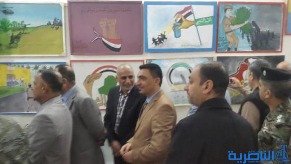النشاط المدرسي في سوق الشيوخ يقيم معرضا للملصق السياسي
