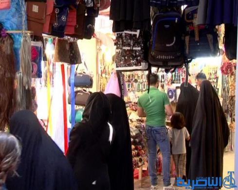 رغم غلاء الاسعار ، اسواق العيد في الناصرية منتعشة والكليجة على موائد المهنئين - تقرير مصور -