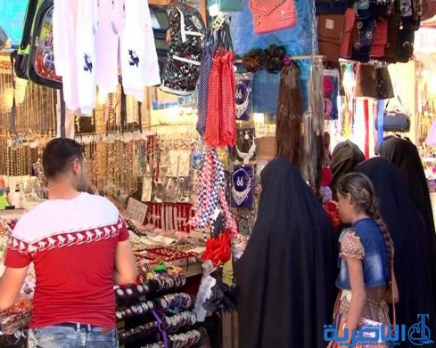 رغم غلاء الاسعار ، اسواق العيد في الناصرية منتعشة والكليجة على موائد المهنئين - تقرير مصور -