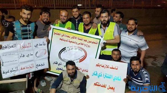 بالصور :شباب على الفيس بوك يعبدون طريقا في الناصرية على نفقتهم الخاصة - تقرير مصور-