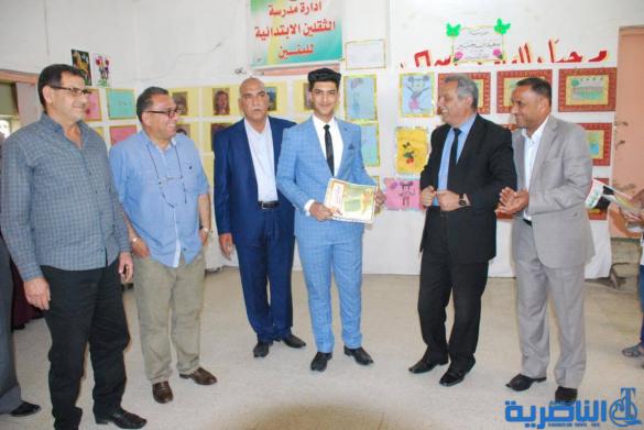 معرضا فنيا في مدرسة سعيد بن جبير الابتدائية في الناصرية