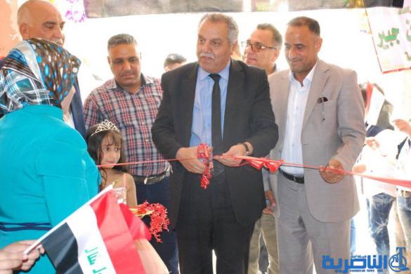 معرضا فنيا في مدرسة سعيد بن جبير الابتدائية في الناصرية