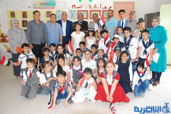 معرضا فنيا في مدرسة سعيد بن جبير الابتدائية في الناصرية