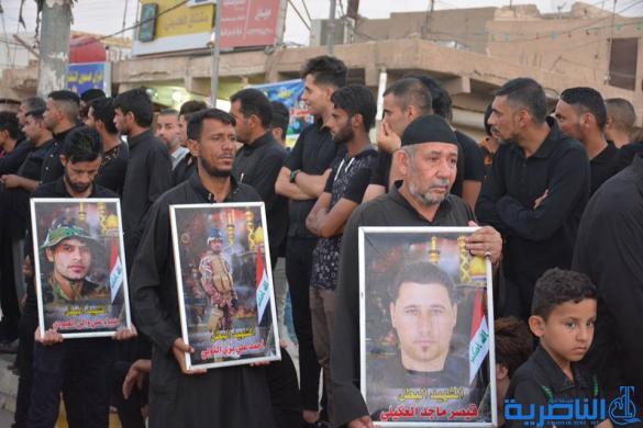 بالصور:الرفاعي تحيي ذكرى عاشوراء بمسيرة للمواكب الحسينية 