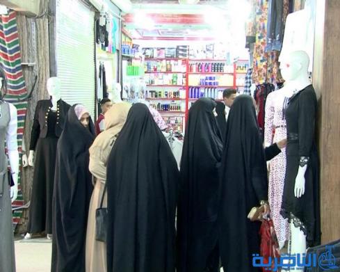 رغم غلاء الاسعار ، اسواق العيد في الناصرية منتعشة والكليجة على موائد المهنئين - تقرير مصور -