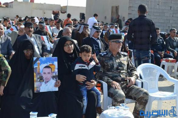 محافظ ذي قار يشارك في تكريم اسر شهداء الحشد الشعبي والقوات الامنية في الرفاعي - تقرير مصور -