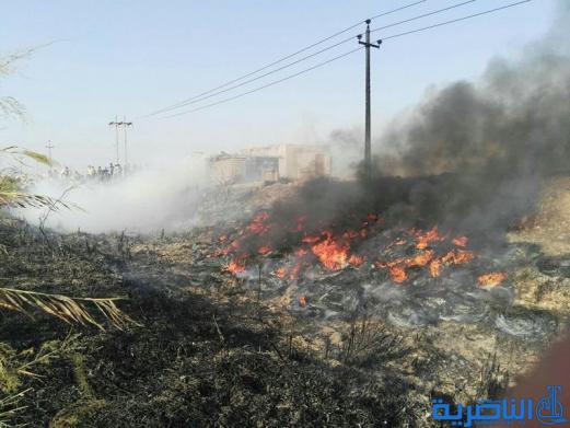 بالصور : السيطرة على حريق كبير قرب سجن الاحكام الخفيفة في الناصرية