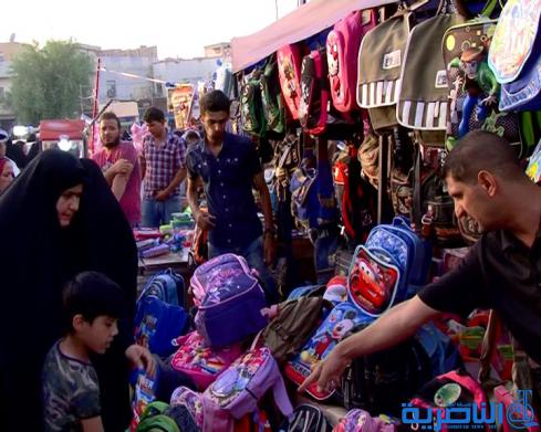 بالصور : في الناصرية ، العيد مرهق بعض الشيء