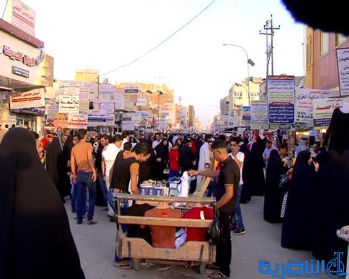 بالصور : في الناصرية ، العيد مرهق بعض الشيء
