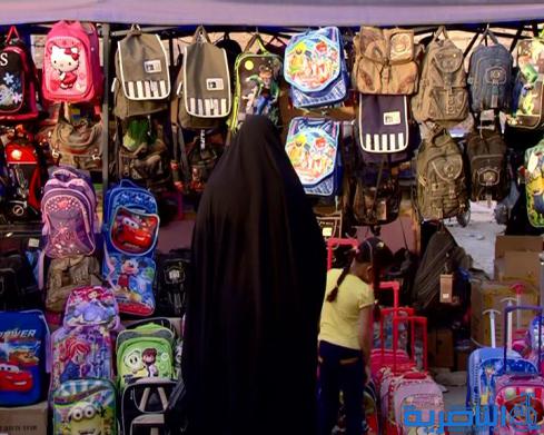 بالصور : في الناصرية ، العيد مرهق بعض الشيء