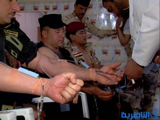  بالصور :عمليات الرافدين تنظم حملة للتبرع بالدم دعما لجرحى المعارك ضد داعش