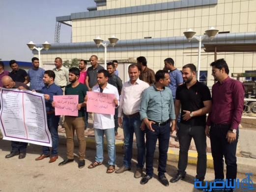  وقفة احتجاجية لكوادر التخدير في ذي قار للمطالبة بتوزيع الاراضي السكنية - تقرير مصور -