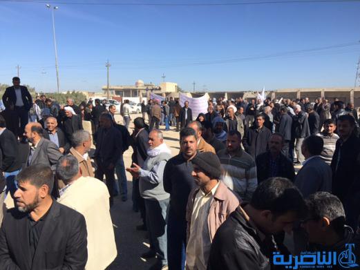 موظفو النسيج في الناصرية يتظاهرون للمطالبة بصرف رواتبهم المتاخرة - تقرير مصور -