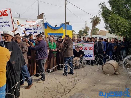 بالصور:العشرات يتظاهرون ضد الخصخصة في ذي قار
