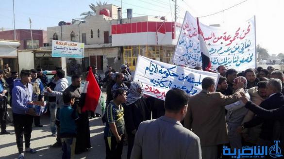 سائقوا الاجرة يتظاهرون للمطالبة بانشاء مراب للنقل وسط الناصرية - تقرير مصور -