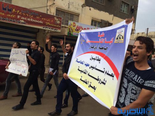  ذي قار :طلبة القانون يتظاهرون ضد قانون جديد يحرمهم من مزاولة المحاماة بعد التخرج - تقرير مصور -