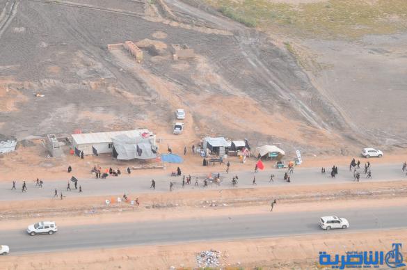 بعدسة شبكة اخبار الناصرية:صور جوية لجموع الزوار على درب الحسين