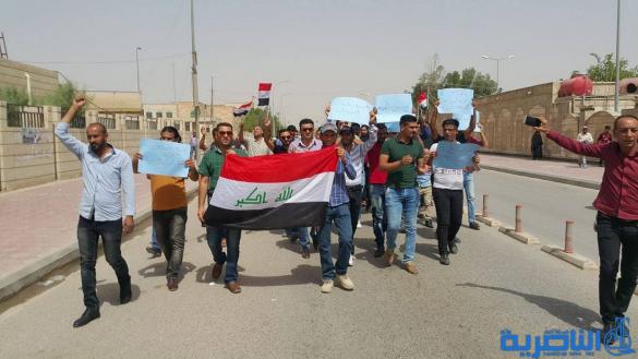 اليوميين في صحة ذي قار يتظاهرون لتثبيتهم على الملاك - تقرير مصور -