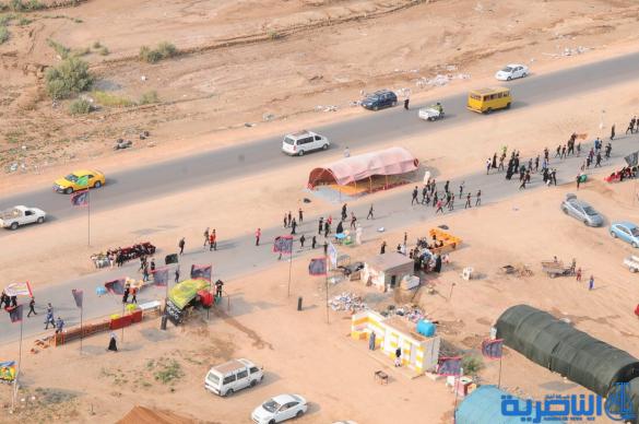 بعدسة شبكة اخبار الناصرية:صور جوية لجموع الزوار على درب الحسين