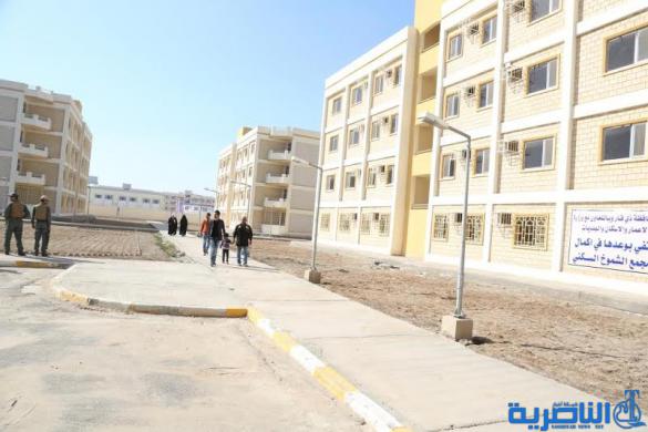 محافظ ذي قار يوزع 380 شقة سكنية في مجمع الشموخ على الشرائح المستفيده ويؤكد تواصل العمل في مشاريع سكنية اخرى - تقرير مصور -