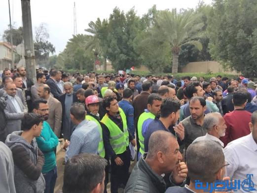 موظفو ماء ذي قار يتظاهرون للمطالبة بتحسين الرواتب - تقرير مصور -